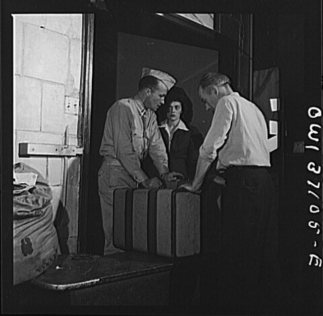Pennsylvania. Passengers checking their bags at the Greyhound bus, Pittsburgh