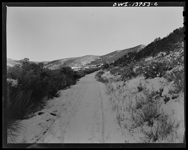 Photo:Taos Valley New Mexico 1943 Snowy Road Mountains Desert Landscape