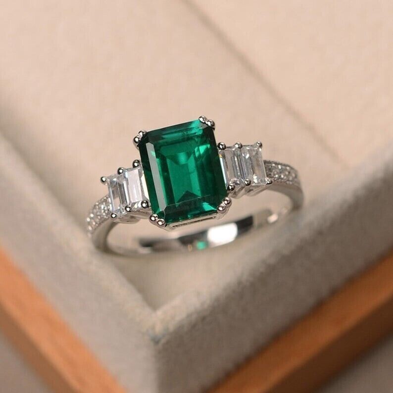 2.50Ct Emerald Cut Simulated Emerald Women's Wedding Ring 14K White Gold Plated