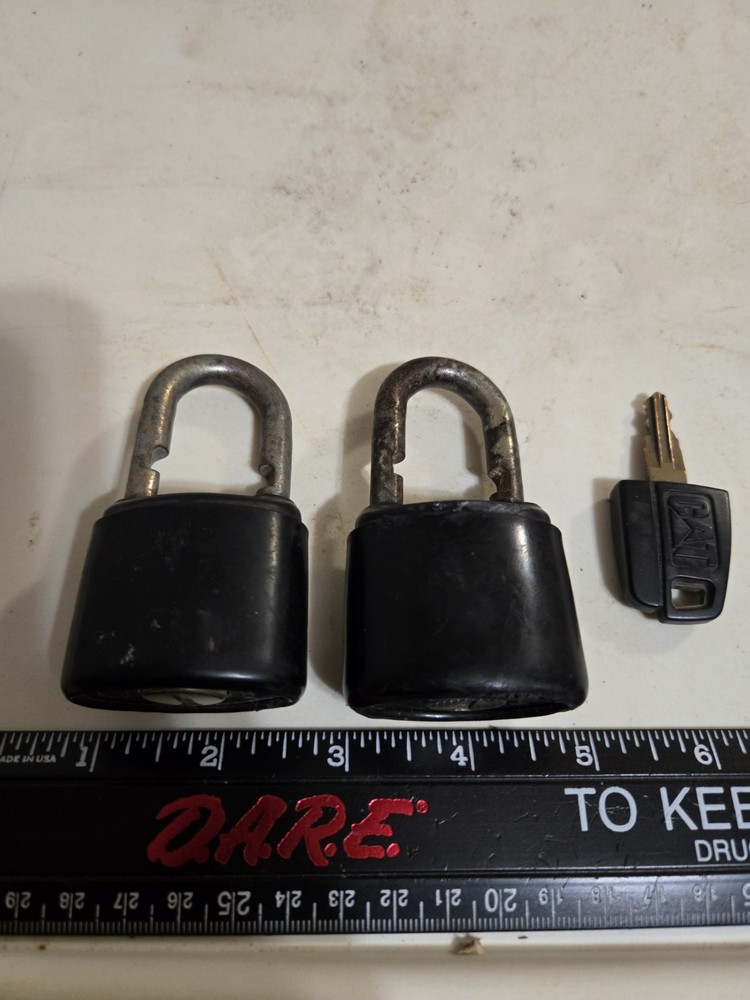 Lot of 2 Vintage Caterpillar CAT  Padlock Logo With One Original Key