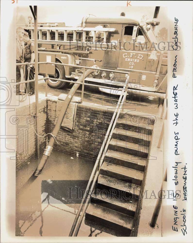 1978 Press Photo Fire engine pumps out water from Cochrane Junior HS basement