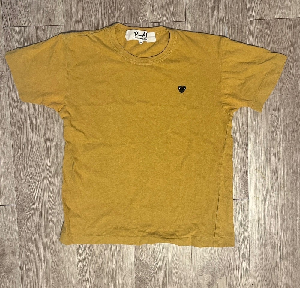 Comme des Garcons PLAY mustard tee with embroidered heart logo