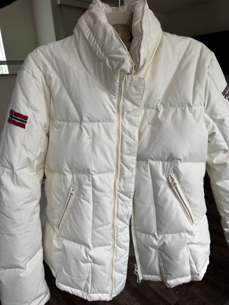 Stylish high-quality down jacket for girls with classic cut