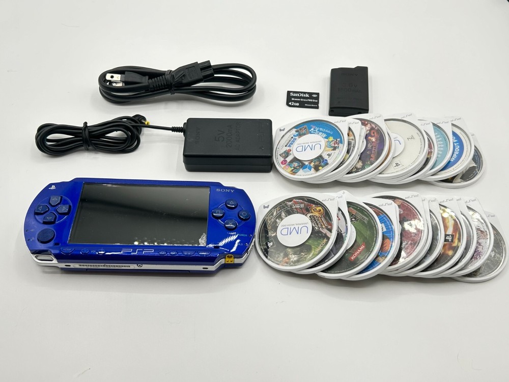 Sony PSP 1000 Metallic Blue Console with Charger Memory Stick and 3 Random Games
