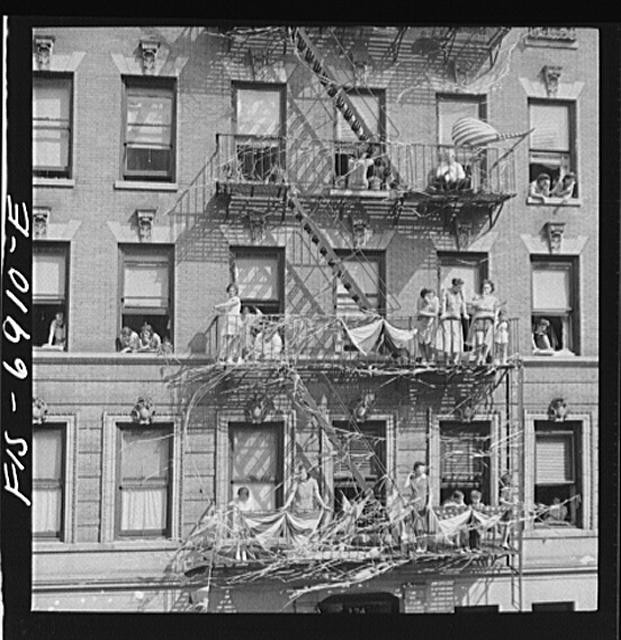 Photo:New York NY Italian Americans 1900s Flag Raising Fire Escape Rain