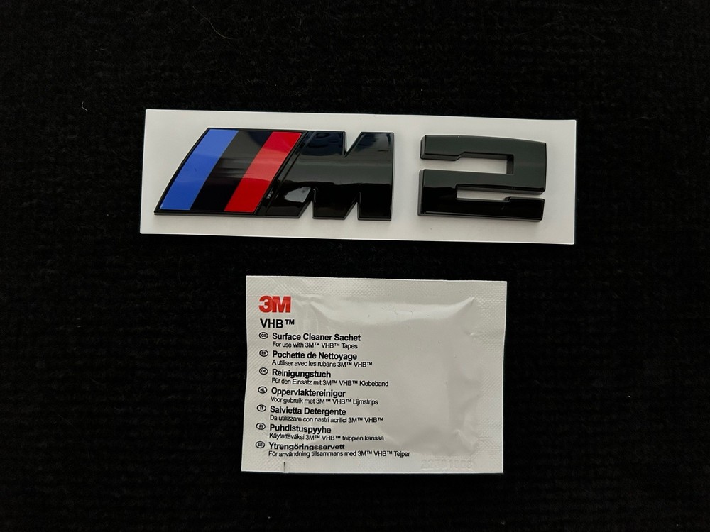 BMW M2 BADGE IN GLOSS BLACK. FREE ALCOHOL WIPE