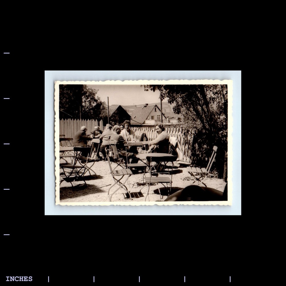 Old Vintage Photo MEN AND WOMEN SITTING AT TABLE IN YARD