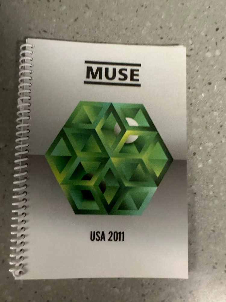 road crew issued MUSE all access pass and tour itinerary