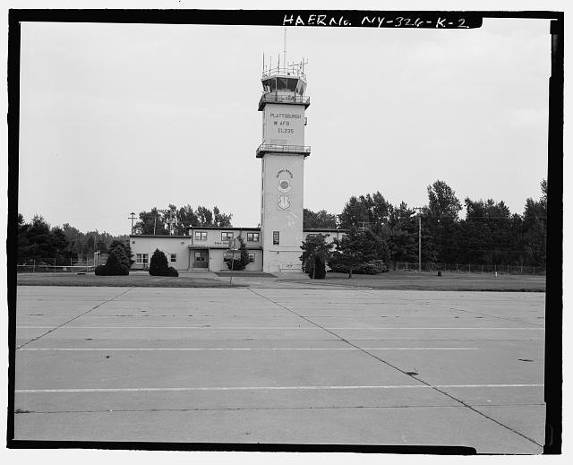 OVERALL view OF BUILDING AND GROUNDS. view TO SOUTHEAST - Plattsburgh Air Force