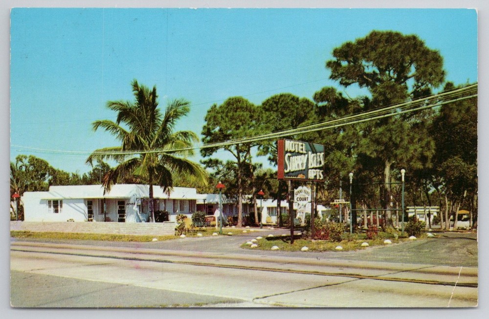 1963 Sunny Isles Cottage Court Hotel, North Miami Beach FL Postcard