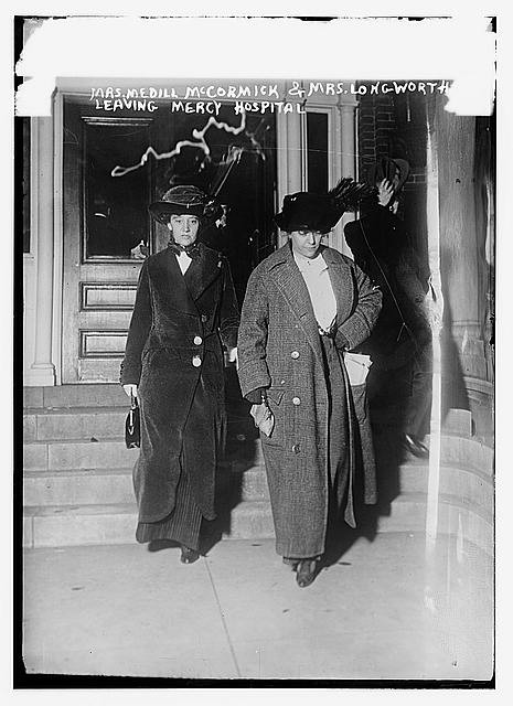 Mrs. Medill McCormick and Mrs. Alice Roosevelt Longworth leaving Mercy Hospital