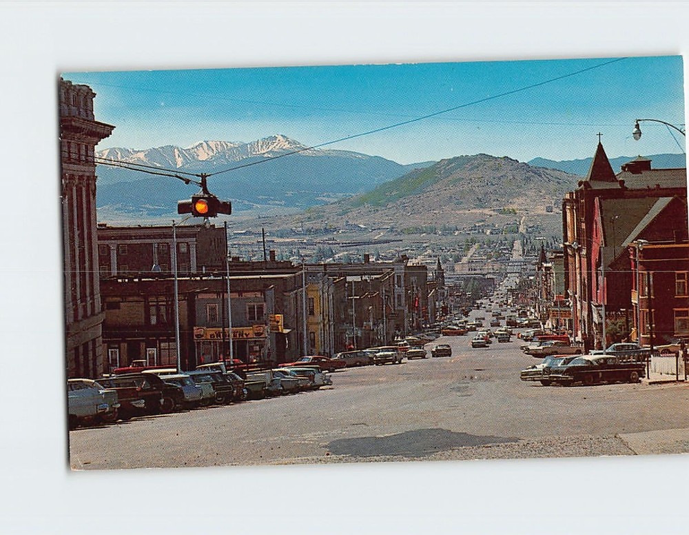 Postcard Montana Street Butte Montana showing Timber Butte Flats & Highlands
