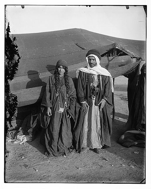 Photo:Bedouin couple in front of tent, Adwan tribe