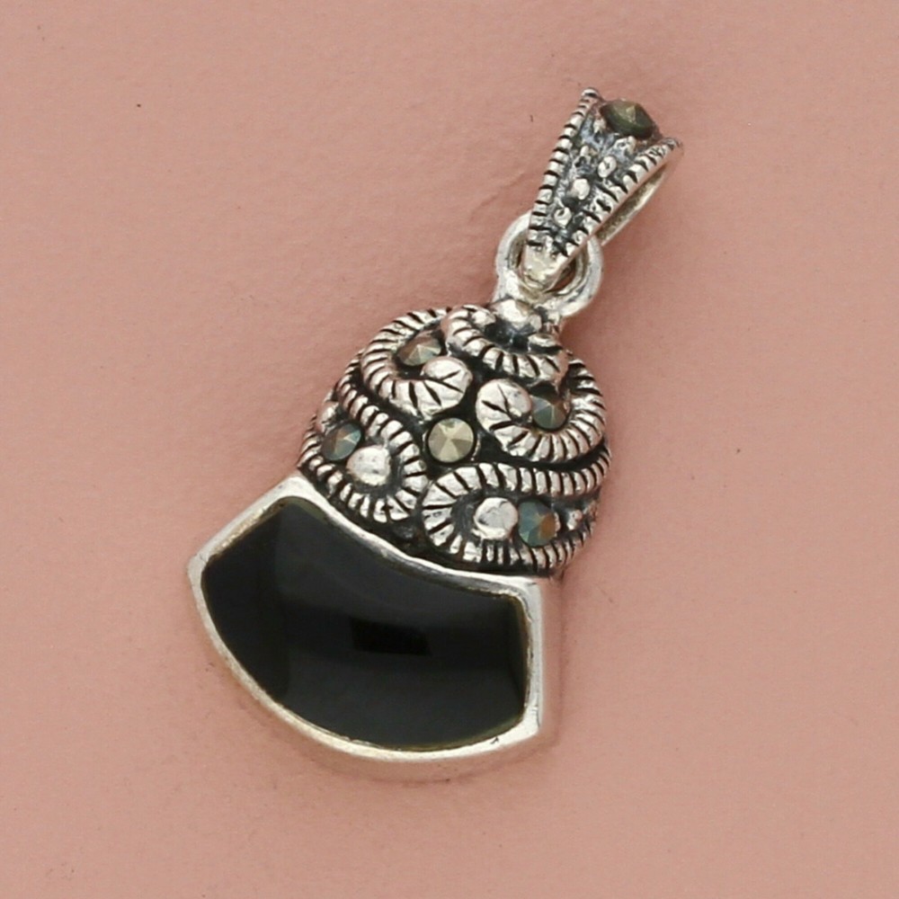 Sterling silver marcasite and black onyx pendant with studded details  
