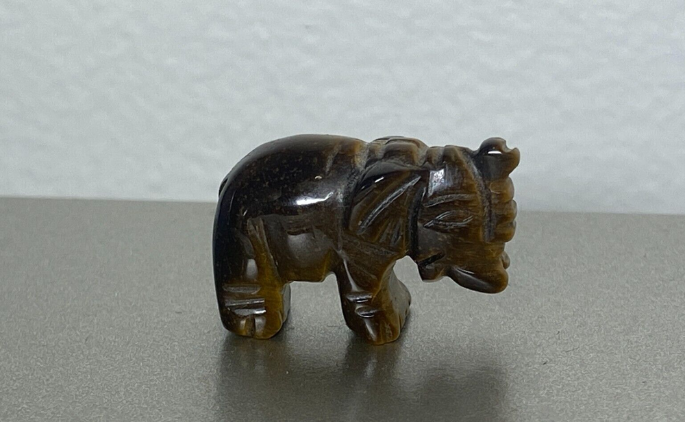 Small tigers eye elephant gemstone carving