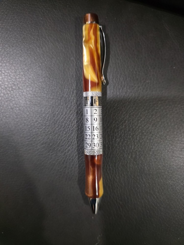 Think (Krone) Calendar Pen Brown Swirl Retired Brand. No Box.