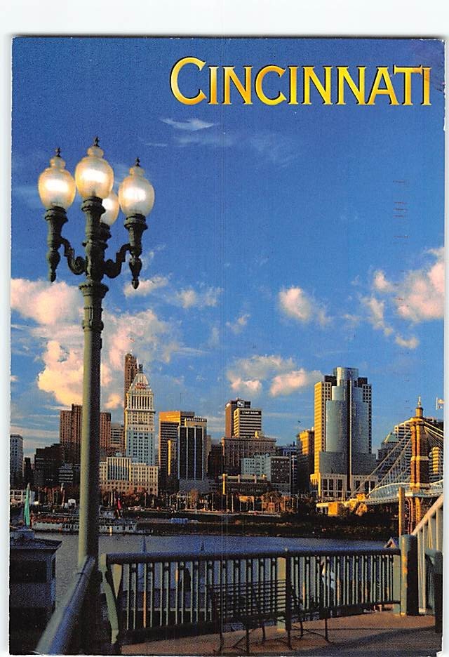 Postcard The Ohio River underscores the city skyline Cincinnati Ohio USA