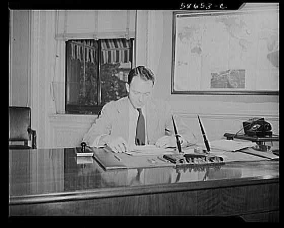 Photo:Man at Desk Office Interior 1930s Writing Papers Map Telephone