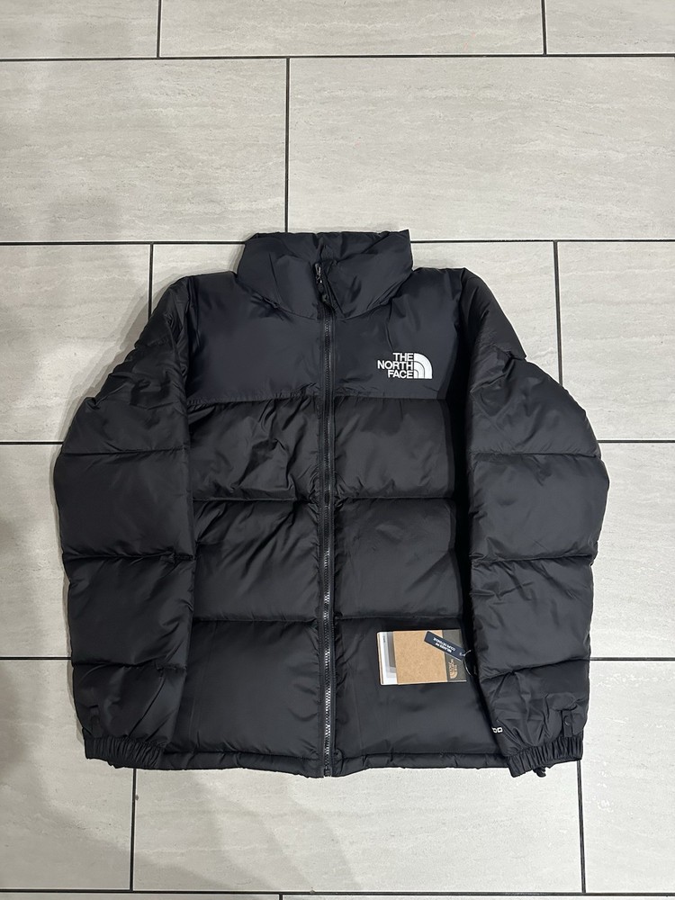 The North Face puffer jacket in Size XL.