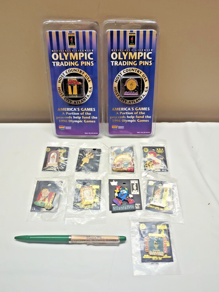 Vintage 1996 Atlanta Olympics Collector Set with 12 Pins and Ink Pen  