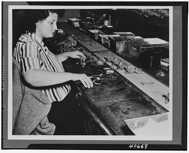 Photo:1940s Woman at Work Factory Assembly Line Production Bench