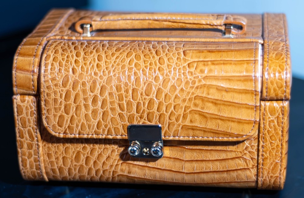 A Reed and Barton- Cognac Croco Leather Jewelry train case with handle