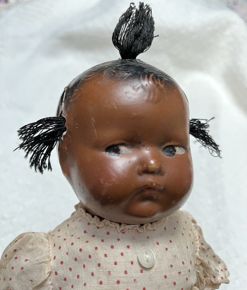 Vintage 9” African-American ￼composite doll w/vtg Dress, Socks, And Tie Booties