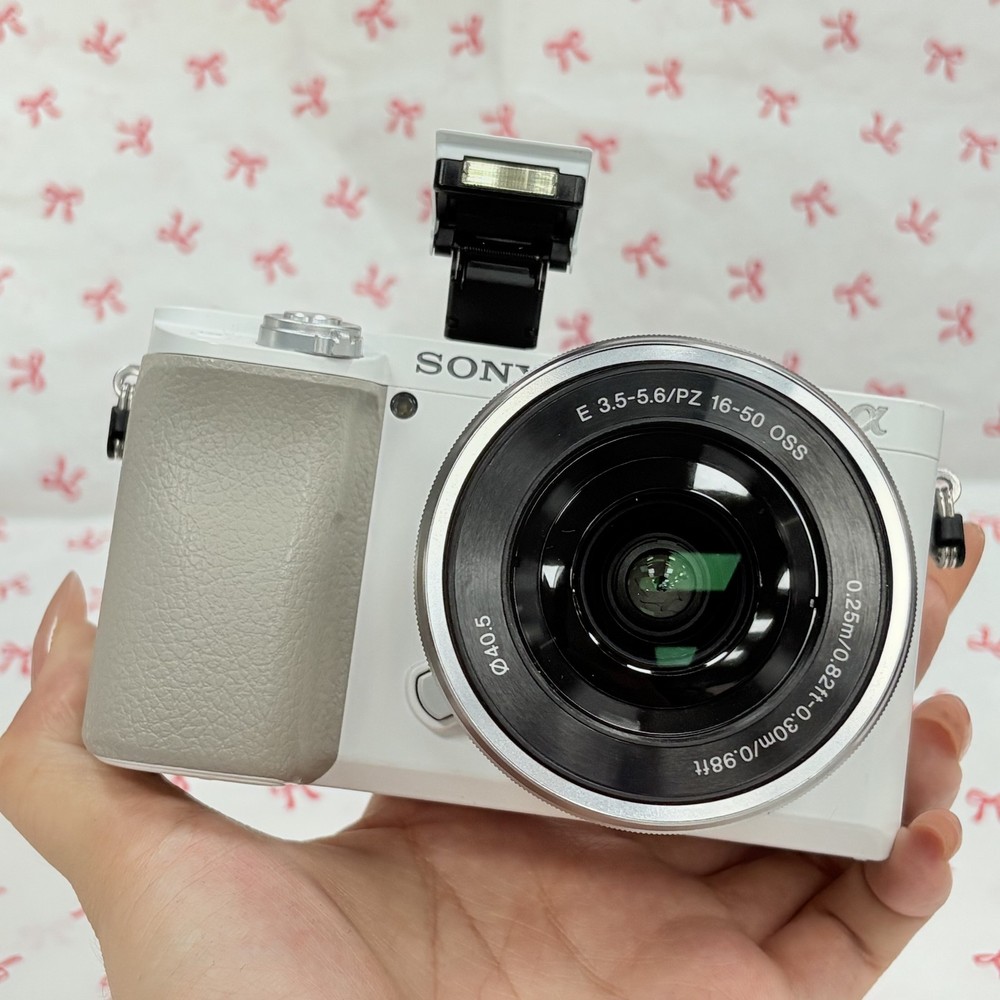 Sony Alpha a6100 24.2MP Mirrorless SLR Digital Camera W/16-50mm Lens White