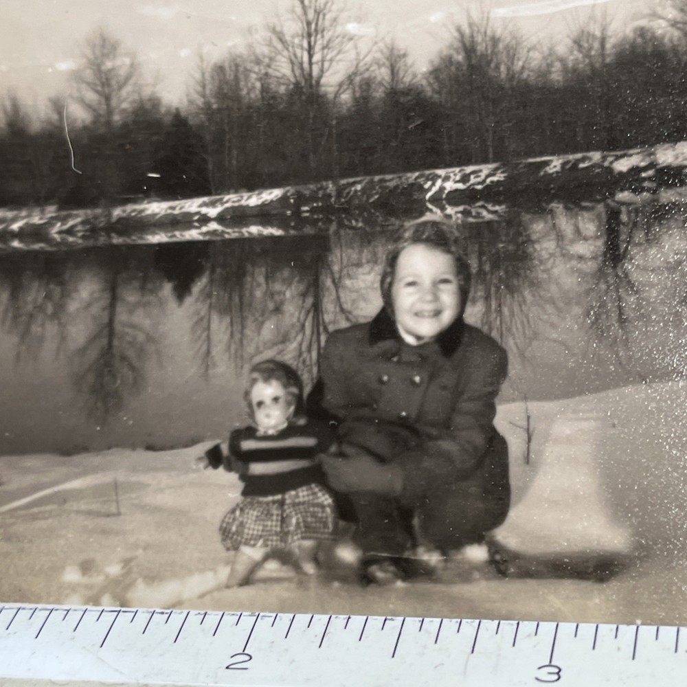 Vintage photograph Snapshot Happy Little Girl Holding Doll Lake Seen 1940s - A1