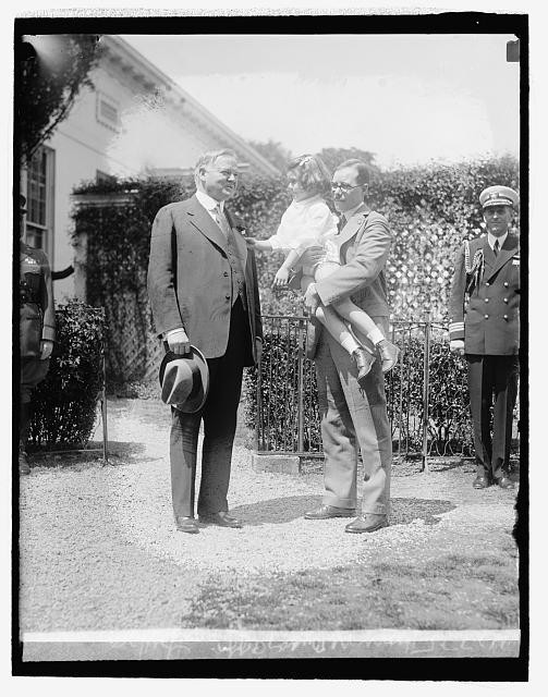 Herbert Hoover receiving Buddy Poppy,President of the United States,April
