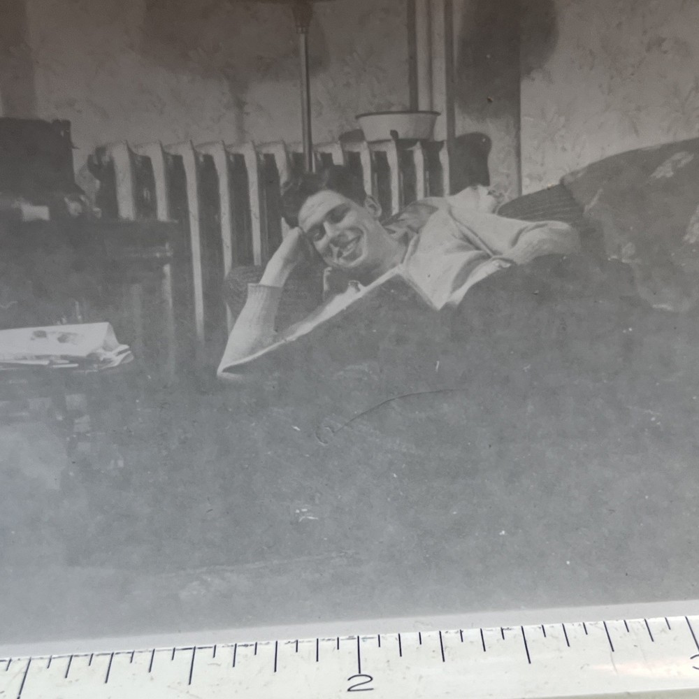 Vintage Photograph Snapshot Happy Man Laying Down Reading Newspaper 1940s - A1