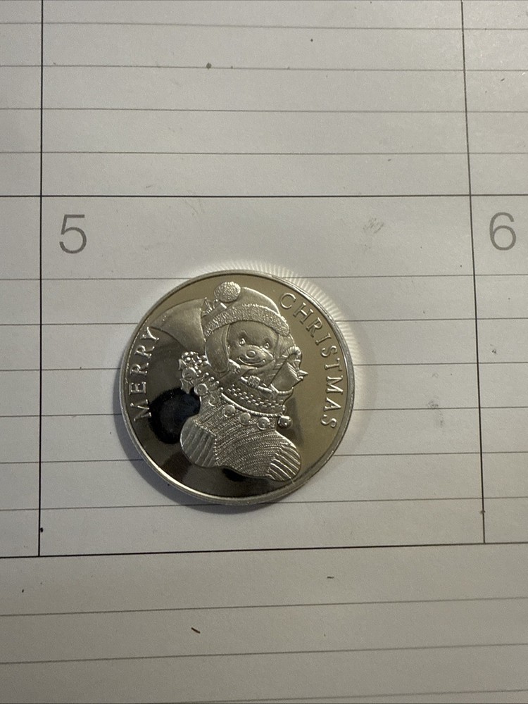 One Troy Ounce .999 Fine Silver Round Proof Seasons Greetings.