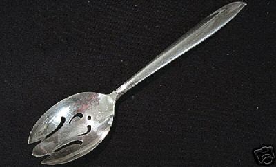 SILVER RHYTHM-INTERNATIONAL STERLING PIERCED SERVING SPOON