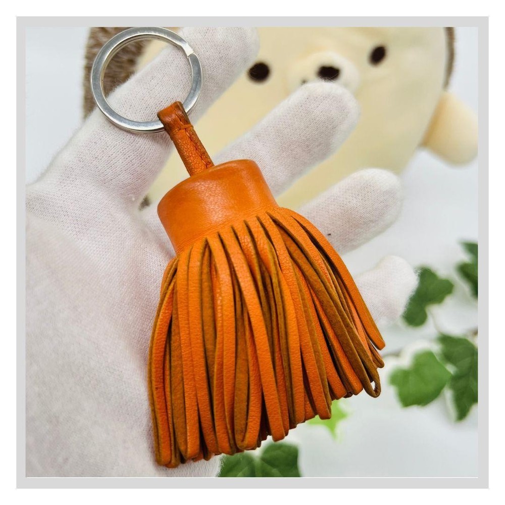 Hermes Carmen Orange Agno Milo Leather Charm
