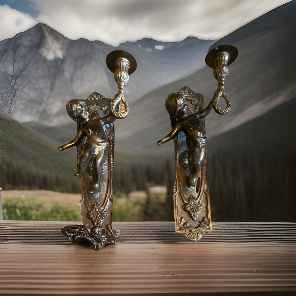 Brass Cherub Wall Sconces Candle Holders Pair    Finish (one is missing part )