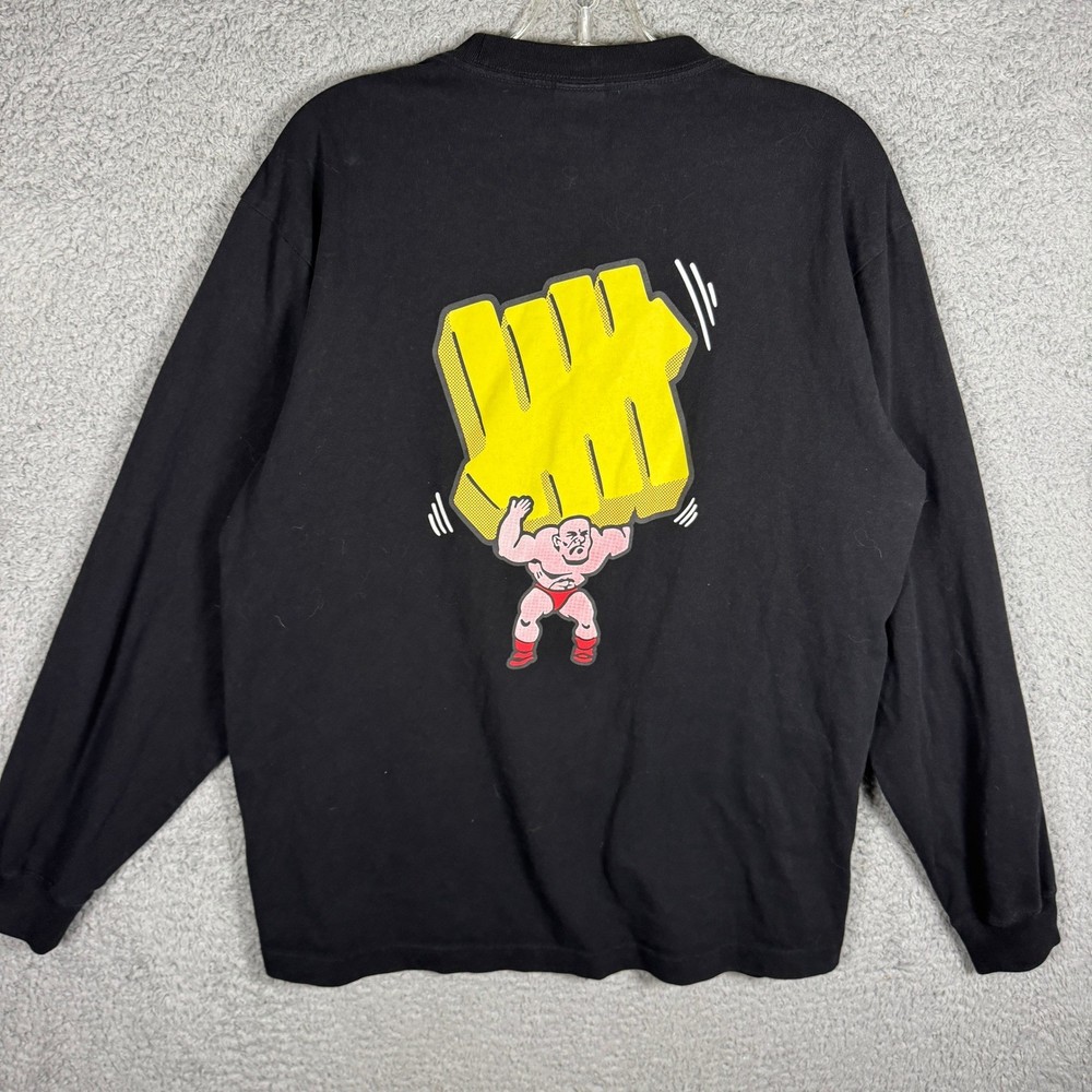 Undefeated Mens Long Sleeve Graphic Tee Black Bodybuilder Logo Size Large
