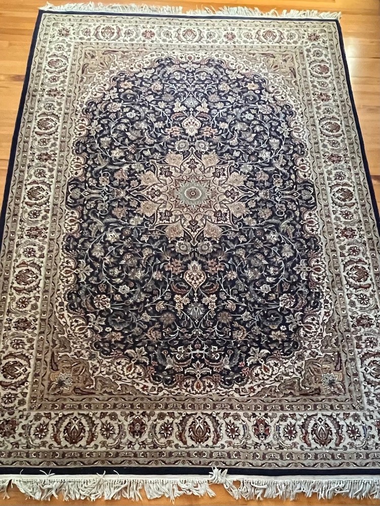 oriental rug wool 6 feet  x 9 feet floral pattern predominantly blue