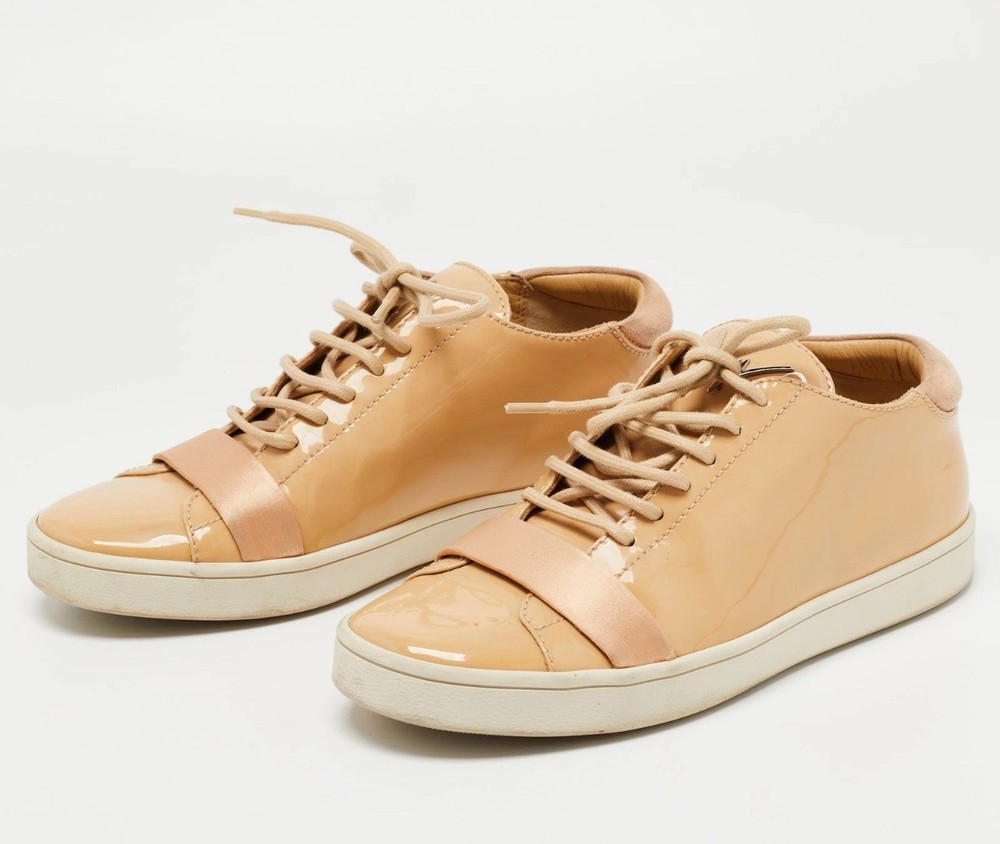 Giuseppe Zanotti Beige Patent Leather Low Top Sneakers Size 37 retails for $350