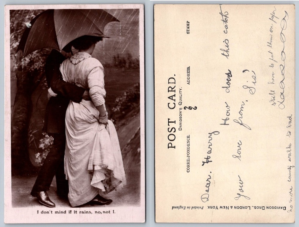 Vintage RPPC Postcard Romantic Couple Under Umbrella in Rain Davidson Bros.