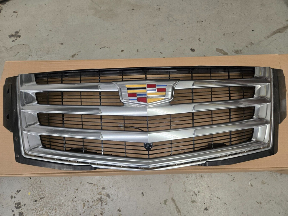Upgrade your Cadillac Escalade (2015-2020) with the genuine OEM 23405570 Radiator Grille Assembly for a sleek and durable replacement