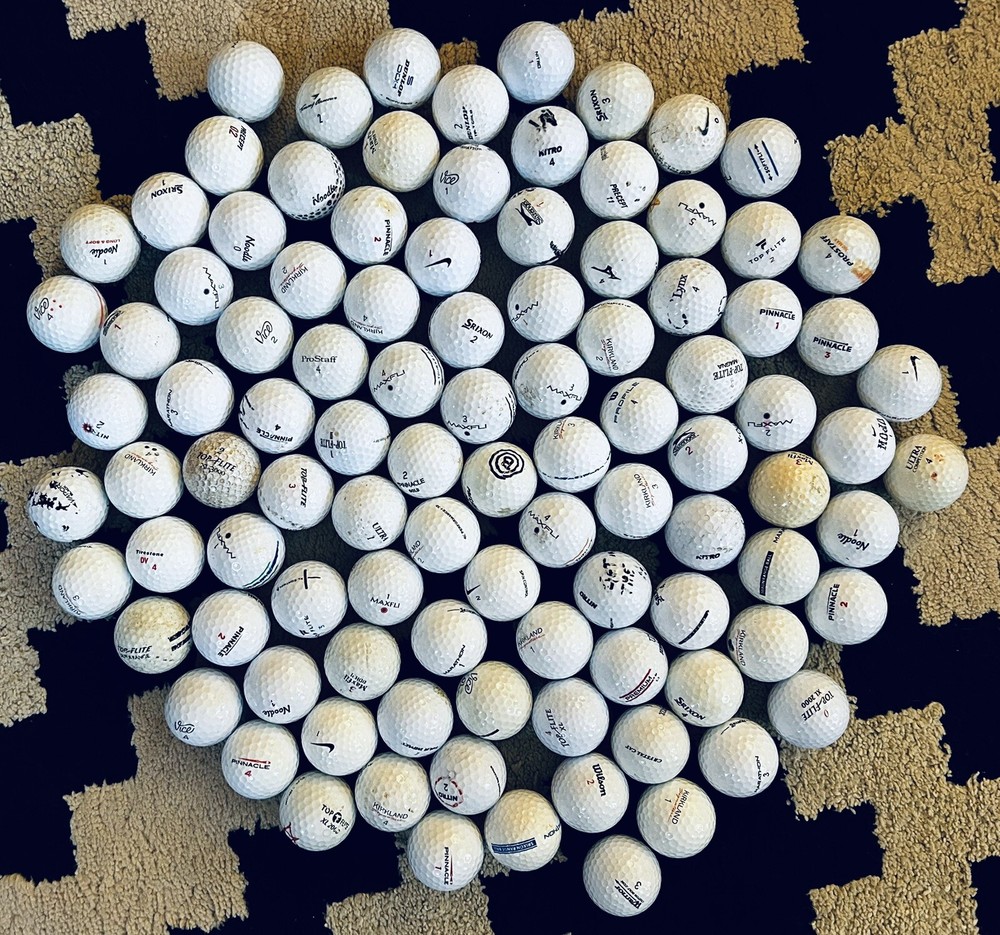 100 golf balls 2A/shag. Assorted brands and models. See photos.