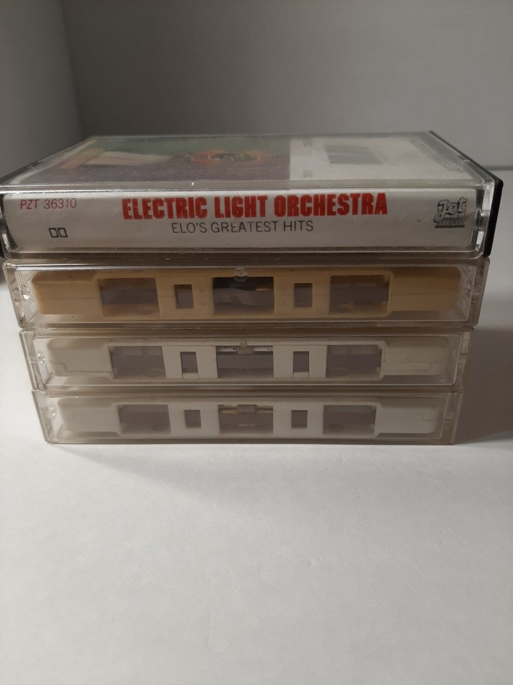 Lot Of 4 Rock Hair Band Cassettes Tapes Firefall Foreigner Fleetwood Mac ELO VTG