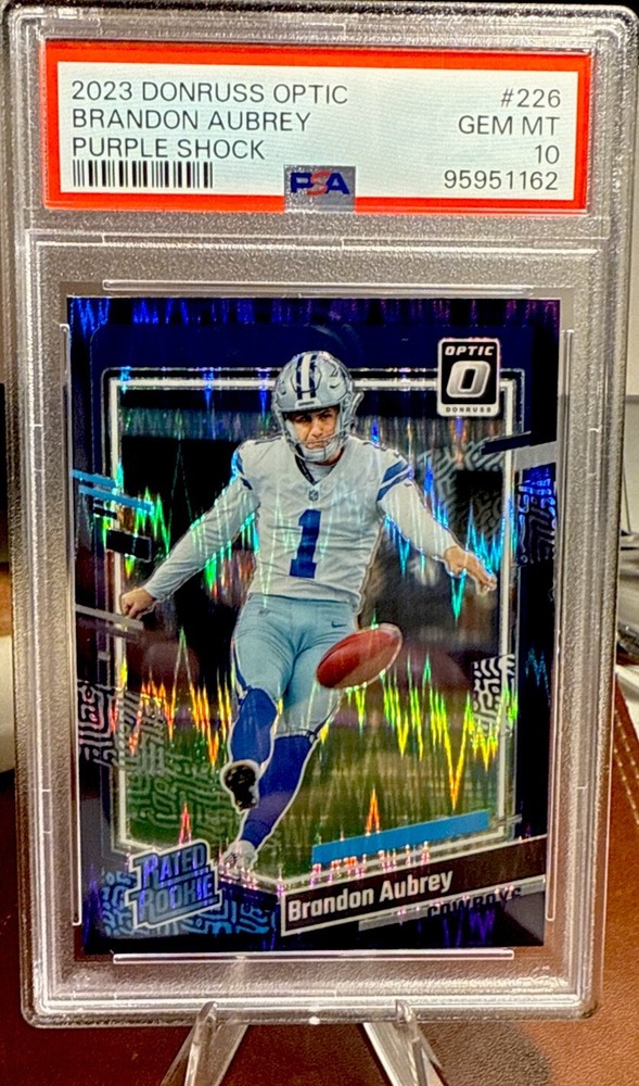 2023 Panini Optic Brandon Aubrey Rated Rookie Purple Shock #226 PSA 10💥Pop 6