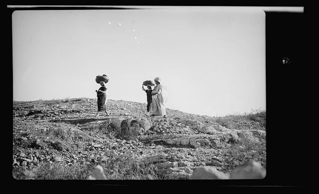 Peasant women going to market basket on head,Middle East,American Colony Photo