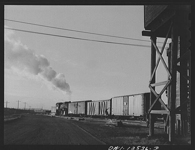 Chicago, Illinois. Making up a train in one of the yards of the Chicago and