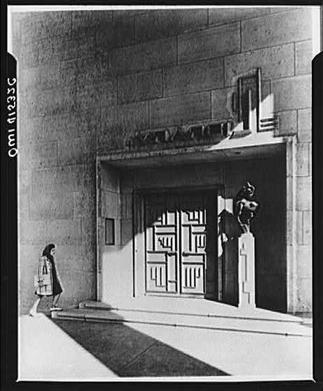 Photo:Art Deco Building Entrance Woman Sculpture 1930s Architectural Photo