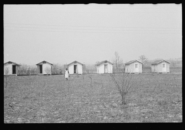 Photo:1930s Rural Cabins Woman Field Landscape Black and White Photo