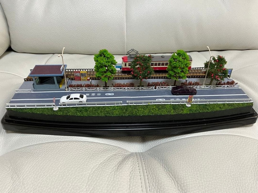 Model train N gauge diorama scenery with a view of the tracks and underpass entr