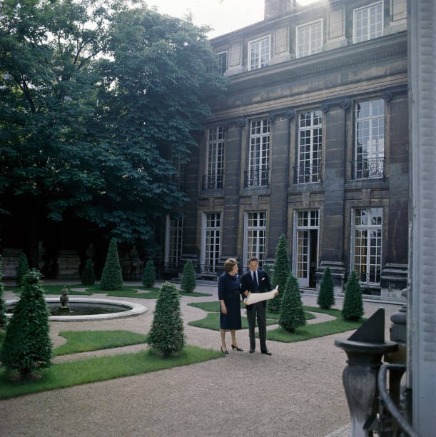 The Baron Alexis De Rede. In Paris, in 1964, in a garden in front - Old Photo