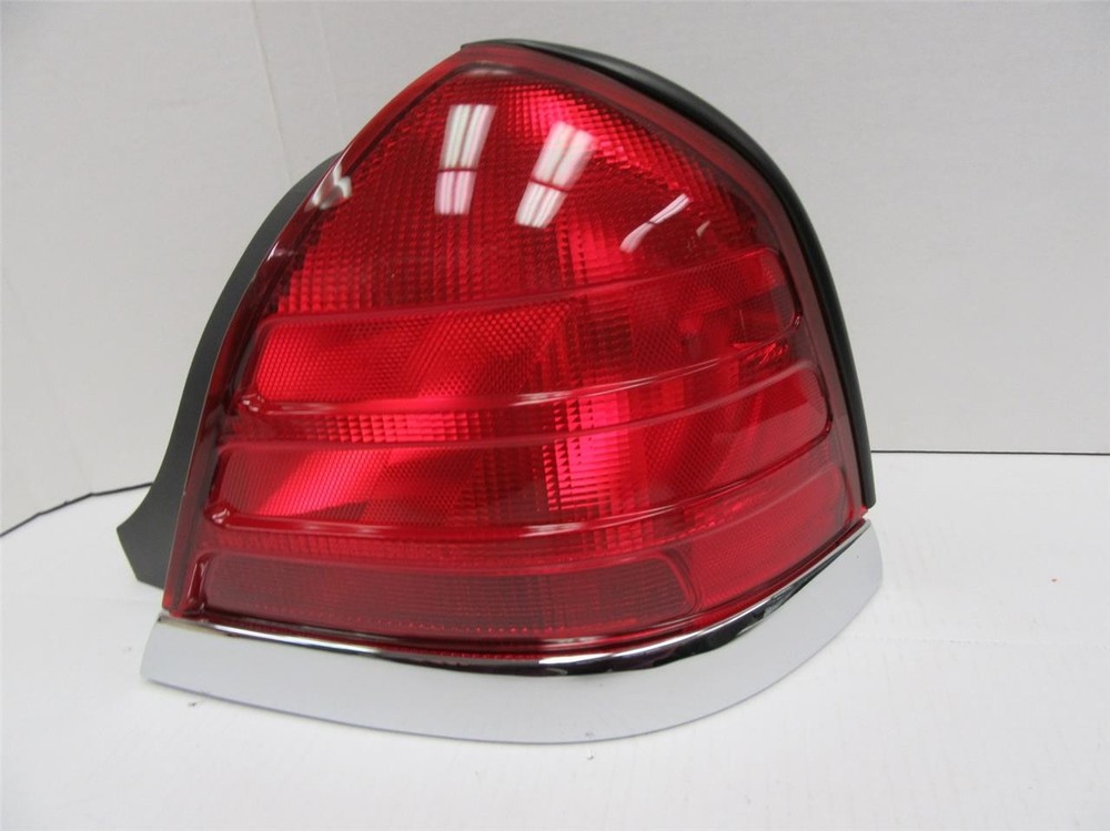 TYC Ford Crown Victoria 99-05 Right Passenger Tail Light with Chrome Trim 11-5371-80